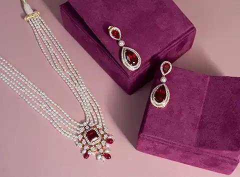 Emerald and diamond necklace set with matching earrings